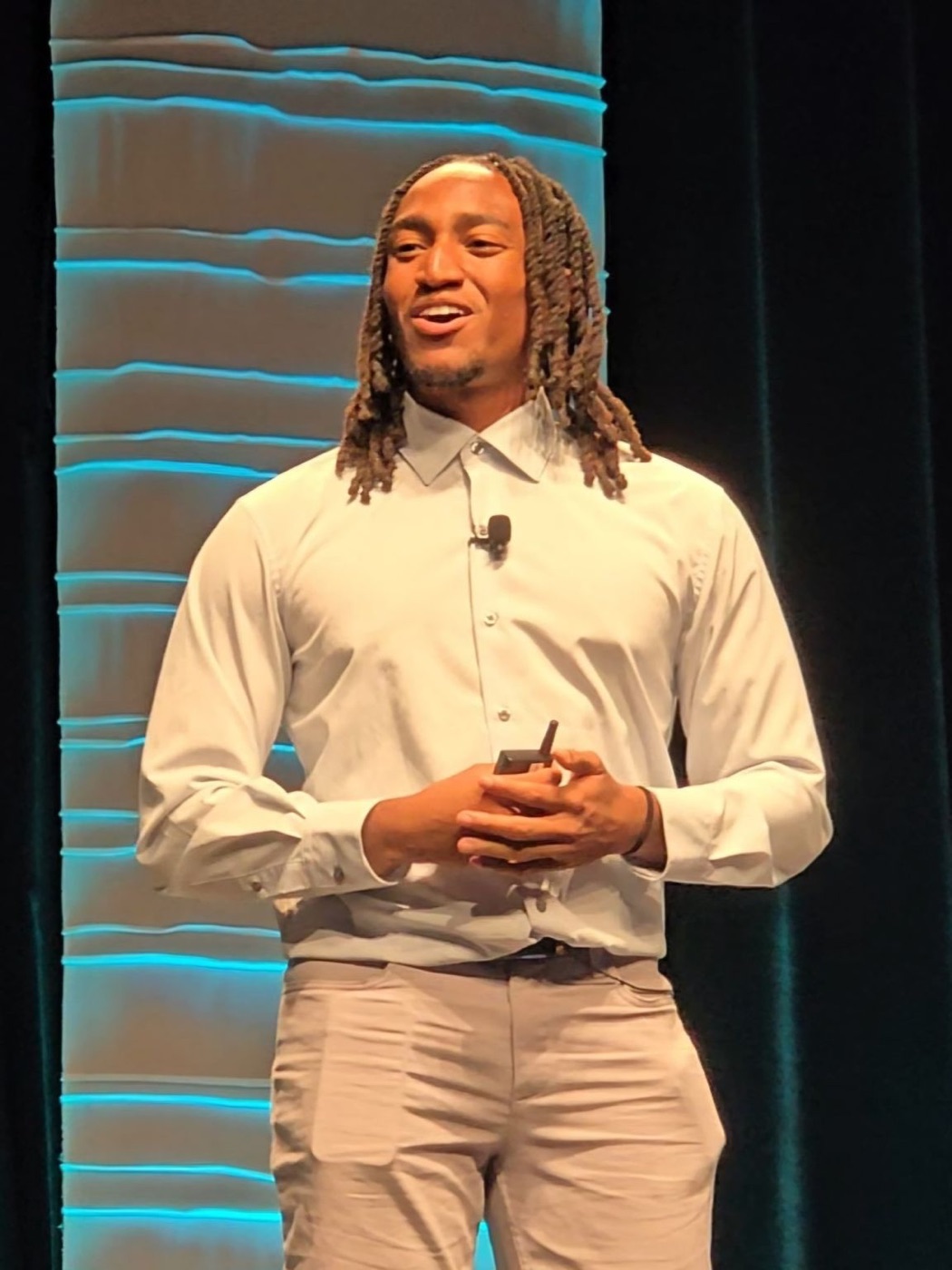 Toggle co-founder Matthew Wade presenting on stage at the Virtuoso Travel Tech Summit.